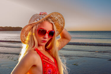 First time model posing outdoors during a beginner-friendly beach photoshoot in Devon