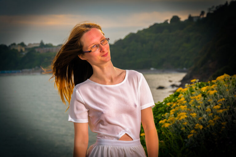 First-time model photographed outdoors at the Devon coast during an evening photoshoot