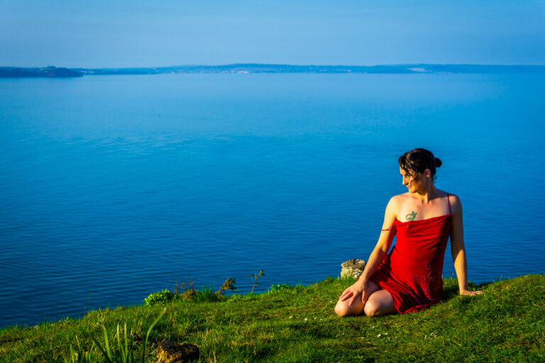 Model portfolio builder session in Devon showing outdoor red dress look